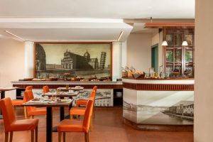 Bright breakfast room with set tables and buffet, welcoming atmosphere near Pisa attractions - Hotel La Pace, BZAR hotels in Pisa